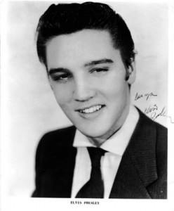 Elvis Presley, whose RCA Victor disk, "Heartbreak Hotel," was the best selling pop record of the year and the country record most played in juke boxes, according to year-end chart recaps. (Click on image for larger view)