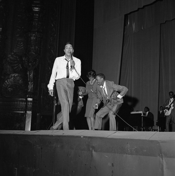 Motor Town Revue flashback: Smokey Robinson and the Miracles onstage at the 1963 Motor Town Revue at the Detroit Fox
