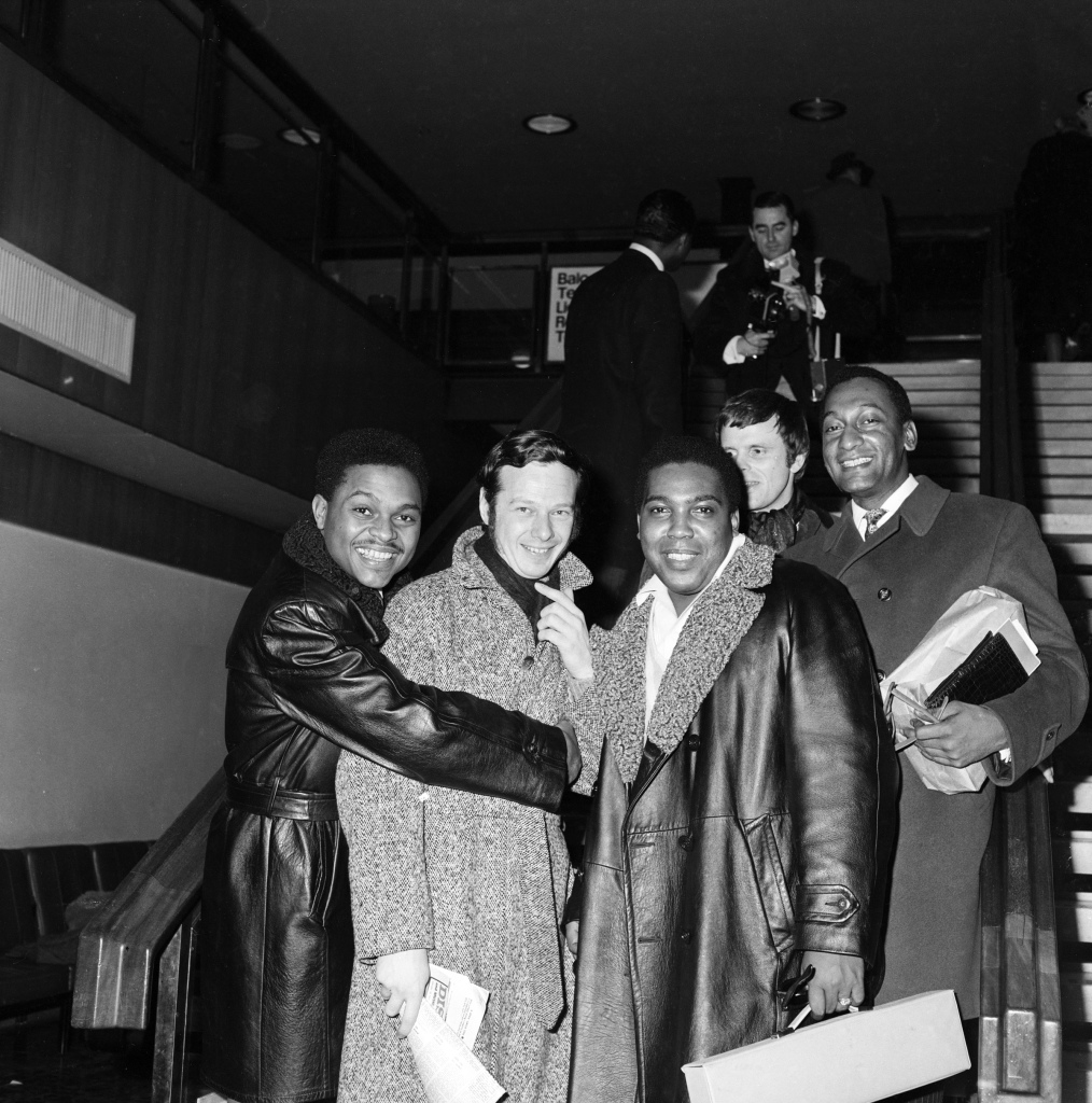 The Four Tops greets Beatles' manager Brian Epstein, Tops' UK tour promoter, at the Royal Albert Hall, January 1967. Beatles' pressman Derek Taylor is seen standing behind Tops' Duke Fakir. (Click on image 2x for largest view).
